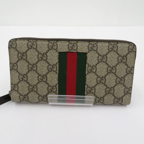 imgrc0089483074 Gucci GG Supreme Web Zip Around Wallet Beige