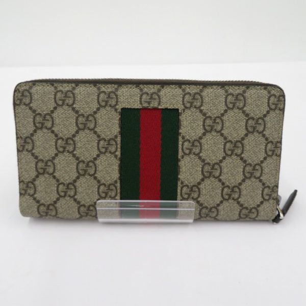 imgrc0089483075 Gucci GG Supreme Web Zip Around Wallet Beige