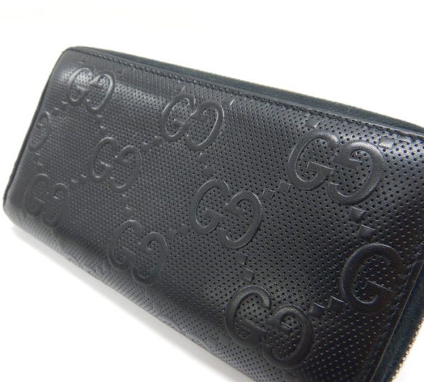 imgrc0092179994 Gucci GG Pattern Embossed Round Zipper Long Wallet Black