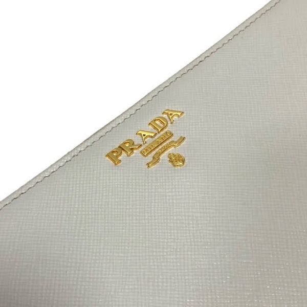 imgrc0093207858 Prada Saffiano Round Zipper Wallet