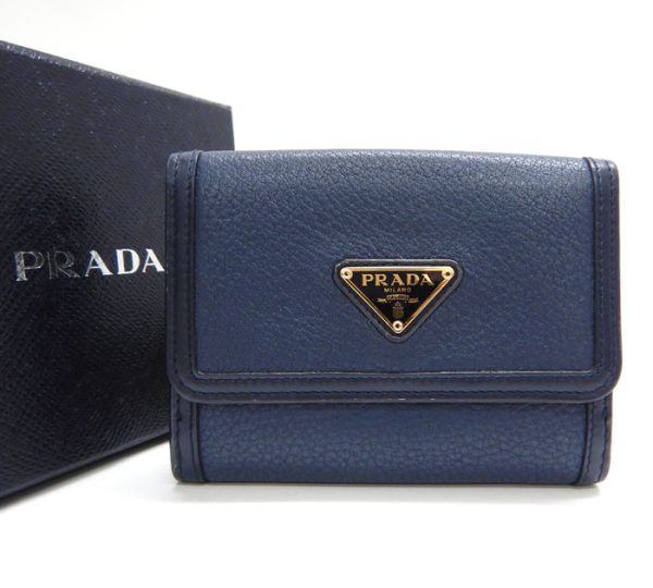 imgrc0093315225 Prada Saffiano Triangle Plate Trifold Wallet Navy