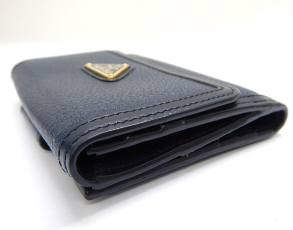 imgrc0093315229 Prada Saffiano Triangle Plate Trifold Wallet Navy