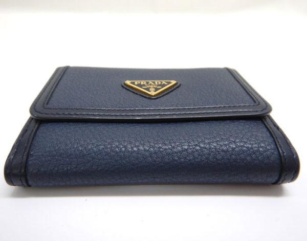 imgrc0093315231 Prada Saffiano Triangle Plate Trifold Wallet Navy