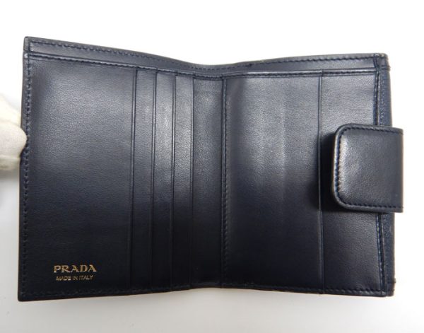 imgrc0093315233 Prada Saffiano Triangle Plate Trifold Wallet Navy