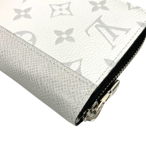 created by Background Eraser LOUIS VUITTON Zippy Wallet Vertical Monogram Taigarama White