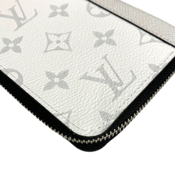 created by Background Eraser LOUIS VUITTON Zippy Wallet Vertical Monogram Taigarama White