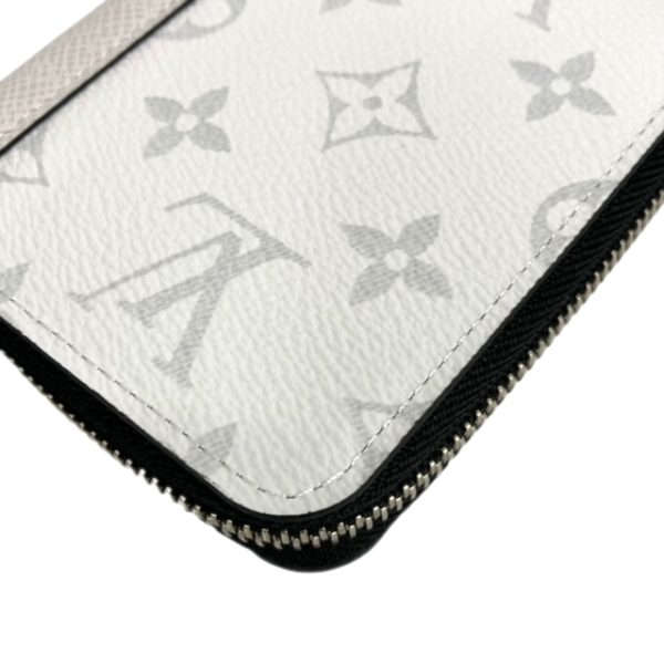 created by Background Eraser LOUIS VUITTON Zippy Wallet Vertical Monogram Taigarama White