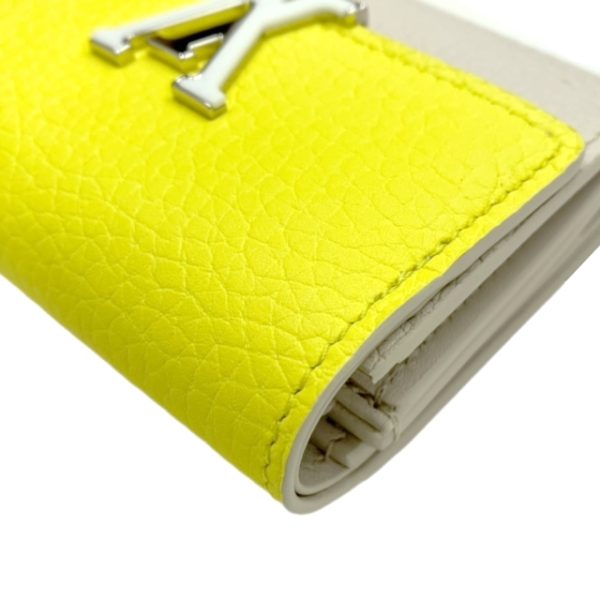 created by Background Eraser LOUIS VUITTON Portefeuille Capucines XS Jaune Fluot Coquine Yellow