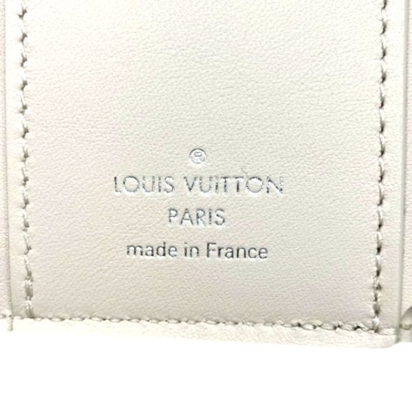 created by Background Eraser LOUIS VUITTON Portefeuille Capucines XS Jaune Fluot Coquine Yellow