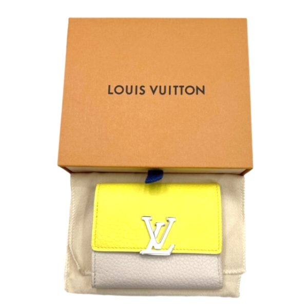 created by Background Eraser LOUIS VUITTON Portefeuille Capucines XS Jaune Fluot Coquine Yellow