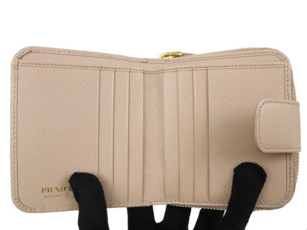 imgrc0096502597 Prada Saffiano Bifold Compact Wallet Beige