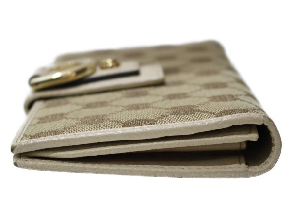 imgrc0097696527 Gucci Abbey GG Canvas Flap Wallet Off White Beige