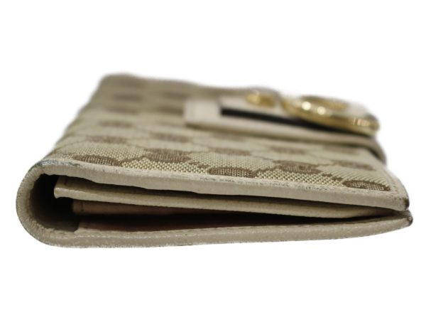 imgrc0097696528 Gucci Abbey GG Canvas Flap Wallet Off White Beige