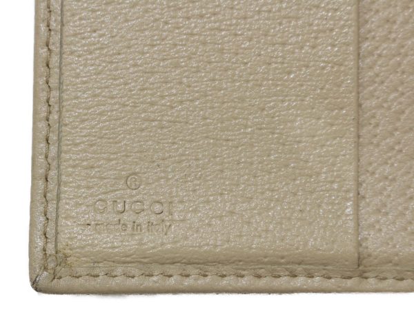 imgrc0097696532 Gucci Abbey GG Canvas Flap Wallet Off White Beige