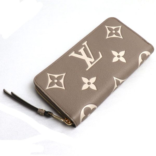 k23 1260 1 1261 LOUIS VUITTON Zippy Long Wallet Bicolor Empreinte Tourtrail