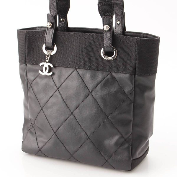 re cha to w 00121 1 Chanel Paris Biarritz PM canvas tote bag Black