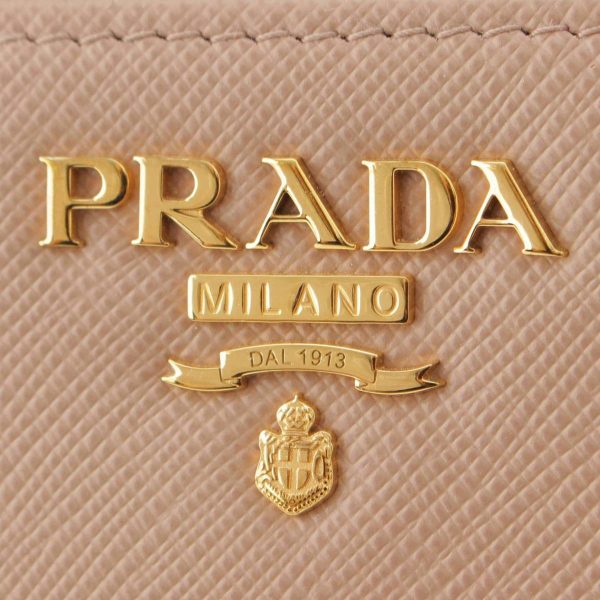 re pra pu w 00064 4 Prada Saffiano Logo Round Zip Wallet Long Wallet Pink