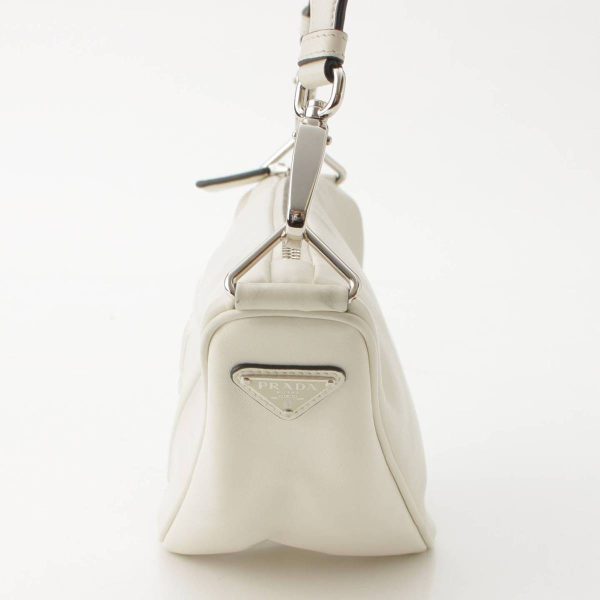 re pra sh w 00191 2 Prada Logo Embossed Triangle Leather Shoulder Bag White