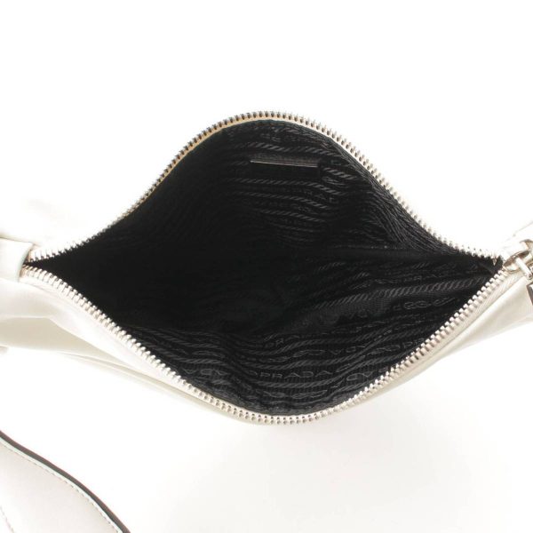 re pra sh w 00191 5 Prada Logo Embossed Triangle Leather Shoulder Bag White