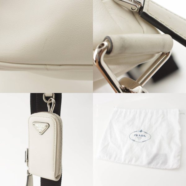 re pra sh w 00191 7 Prada Logo Embossed Triangle Leather Shoulder Bag White