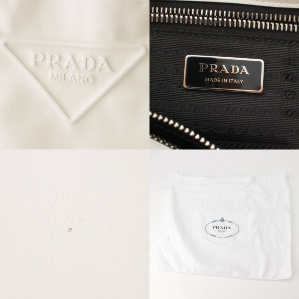 re pra to w 00197 6 Prada Triangle Leather Embossed Tote Bag White