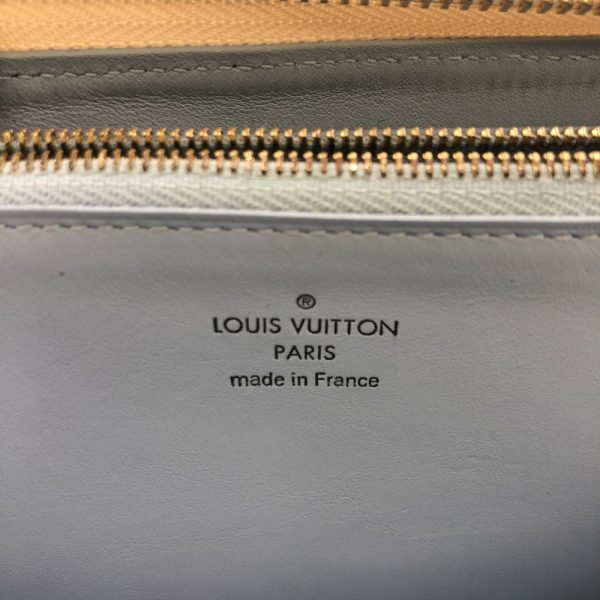 z0004006 8 LOUIS VUITTON M69504 Taurillon Portefeuille Comet Long Wallet Cream