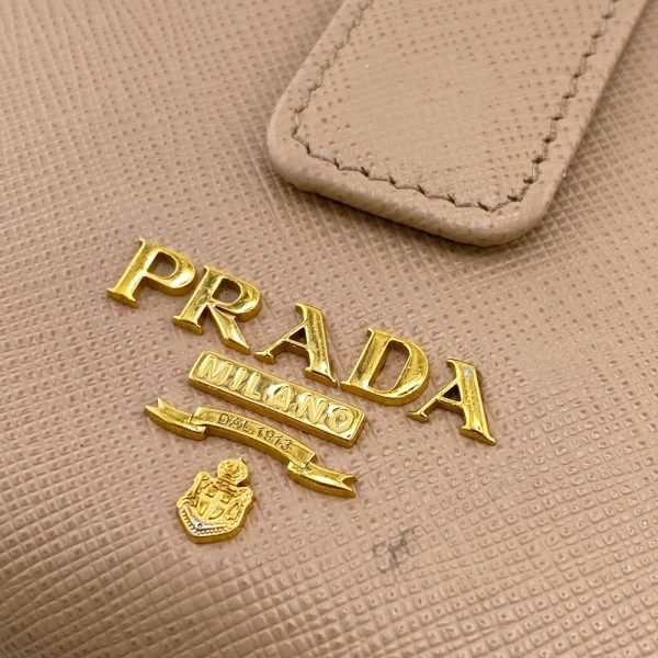 z0006048 7 PRADA 1MV025 Round Zipper Saffiano Long Wallet Beige