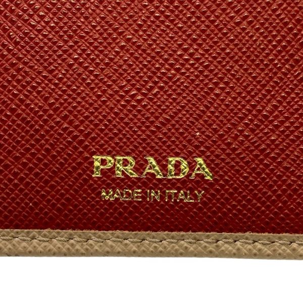 z0006048 9 PRADA 1MV025 Round Zipper Saffiano Long Wallet Beige