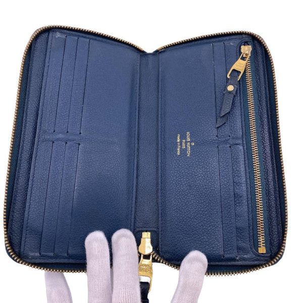 z0006490 8 LOUIS VUITTON M80958 Zippy Vertical Empreinte Wallet Blue