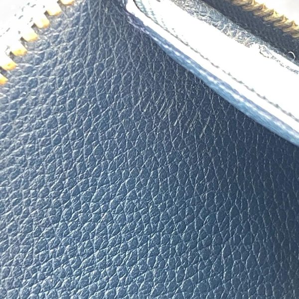 z0006490 9 LOUIS VUITTON M80958 Zippy Vertical Empreinte Wallet Blue