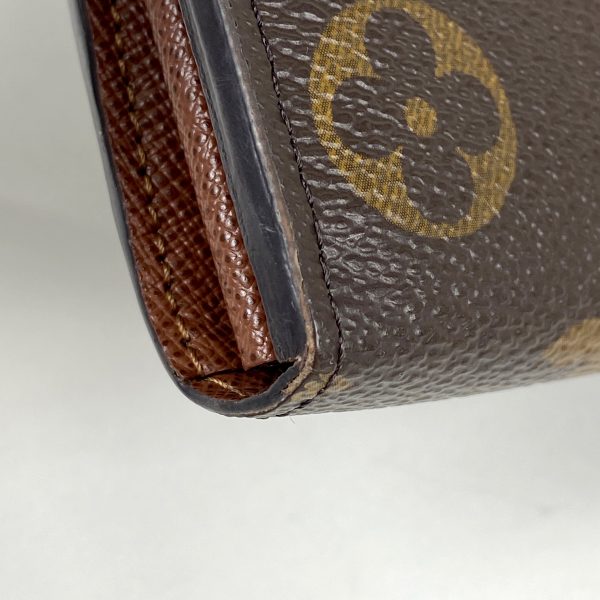 1000015325098 12 Louis Vuitton Portefeuille Sara Coin Wallet Brown 1M6053