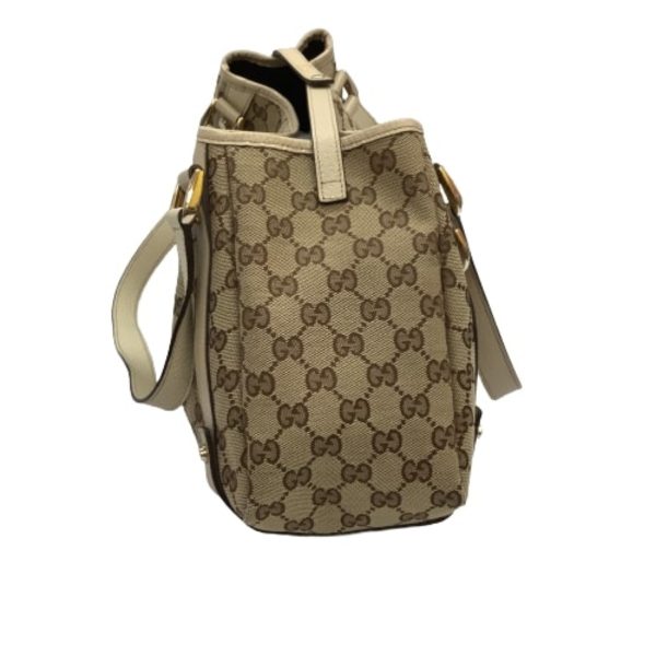 1002100882585 6 GUCCI handbag Beige