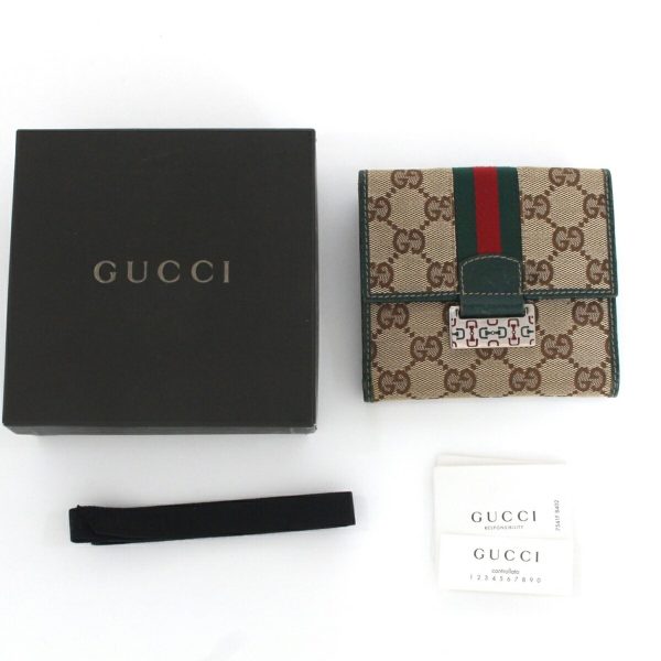 1010104632839 2 GUCCI GG W hook Wallet