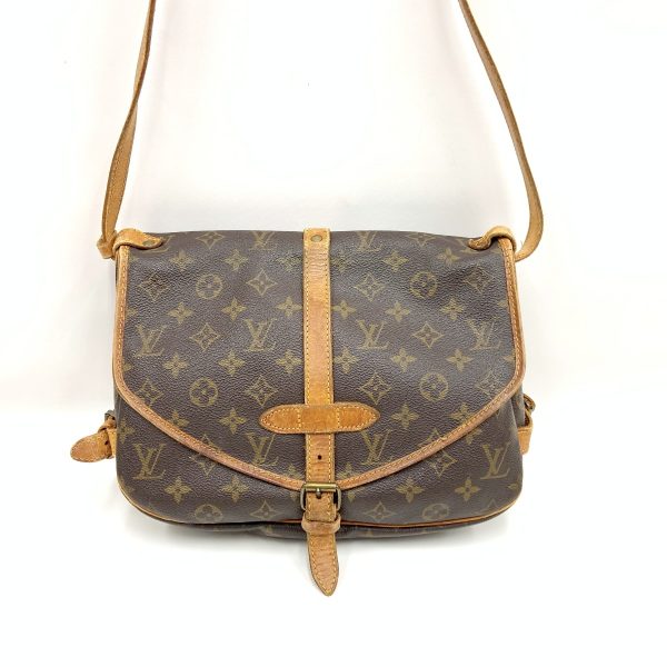 1016003246757 1 LOUIS VUITTON Monogram Saumur Shoulder Bag Brown