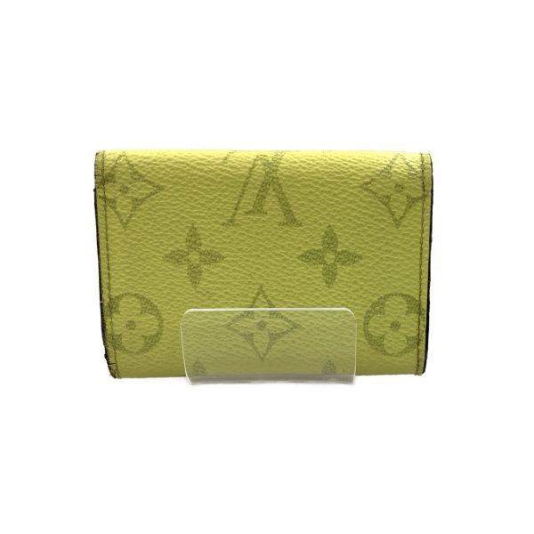 1016003267974 2 LOUIS VUITTON Taiga Lama Discovery Wallet Yellow