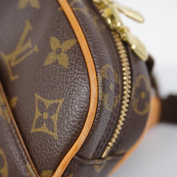 1240001049868 7 Louis Vuitton Monogram Pochette Ganju Body Bag Brown