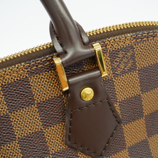 1240001050550 12 Louis Vuitton Damier Alma Handbag Ebene