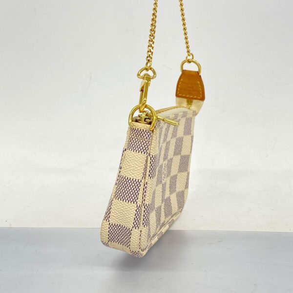 1240001050612 2 Louis Vuitton Damier Azur Mini Pochette Accessory Pouch White