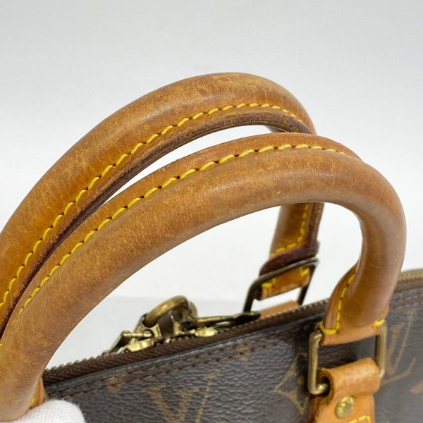 1240001051387 6 Louis Vuitton Alma Monogram Handbag Brown