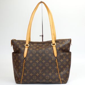 1240002052805 1 Louis Vuitton Monogram Pochette Accessoire Brown