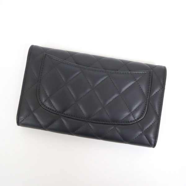 2000114256100057 2 Chanel Matelasse triflong wallet black caviar skin