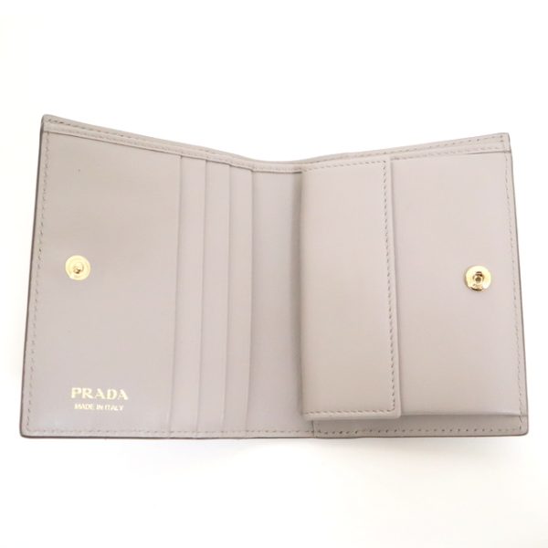 2000234256100037 4 Prada Saffiano Wallet Beige