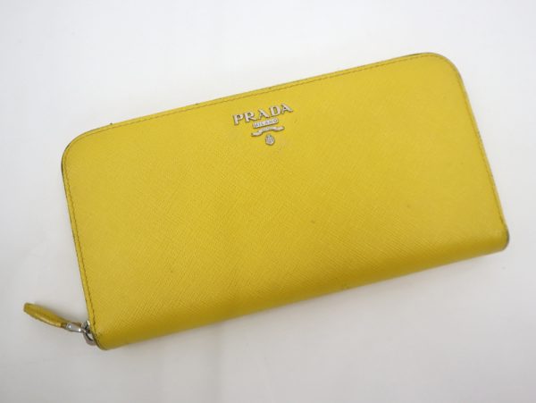 2000234256300009 1 Prada Saffiano long wallet yellow