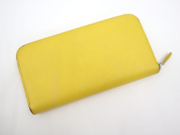 2000234256300009 2 Prada Saffiano long wallet yellow