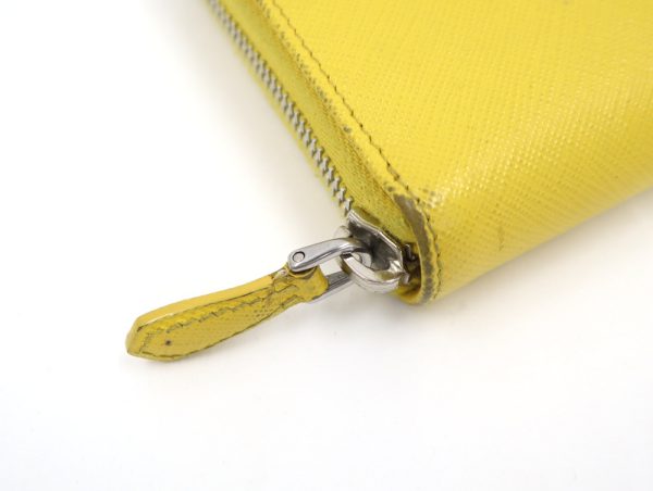 2000234256300009 4 Prada Saffiano long wallet yellow