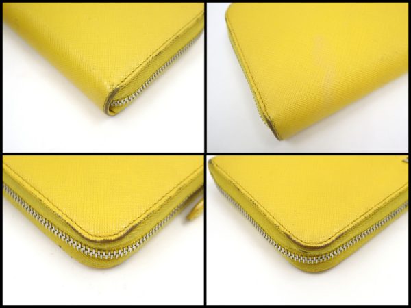 2000234256300009 5 Prada Saffiano long wallet yellow