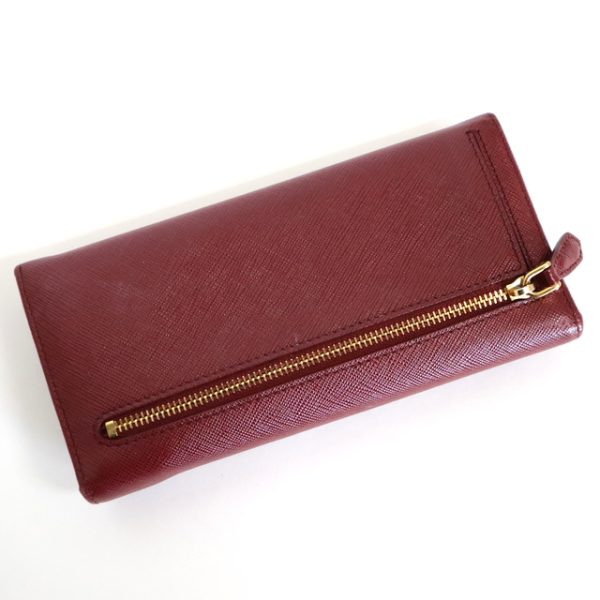 2000234256500032 2 Prada Saffiano bi flong wallet red