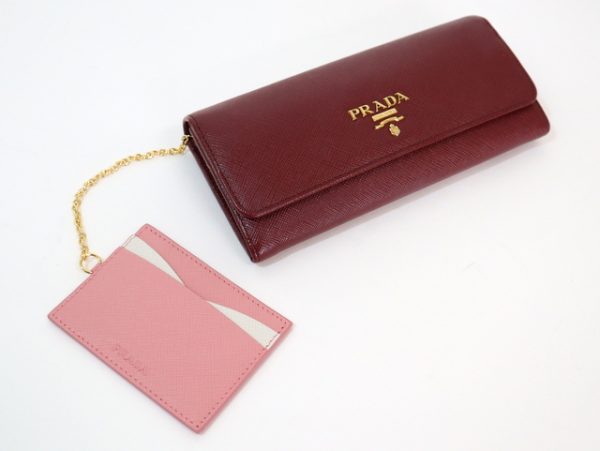 2000234256500032 3 Prada Saffiano bi flong wallet red