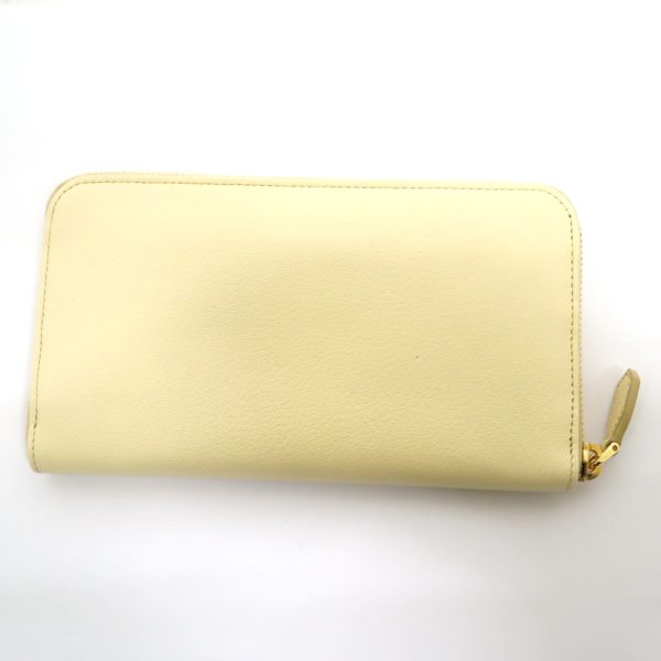 2000234256500052 2 Prada long wallet yellow