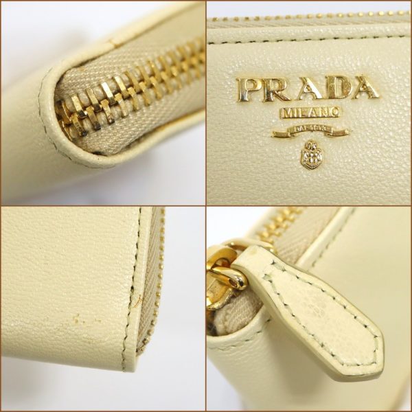 2000234256500052 3 Prada long wallet yellow